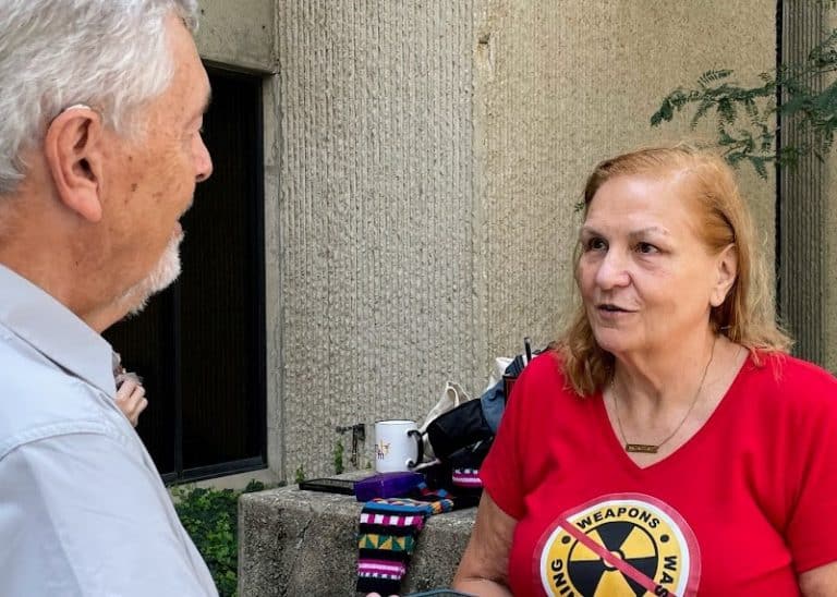 Ann Suellentrop is interviewed by Jim Hannah outside the courthouse.--Photo by Kriss Avery